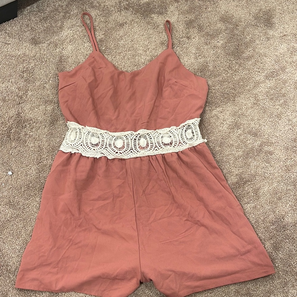 Womens romper size L fits more like small or medium